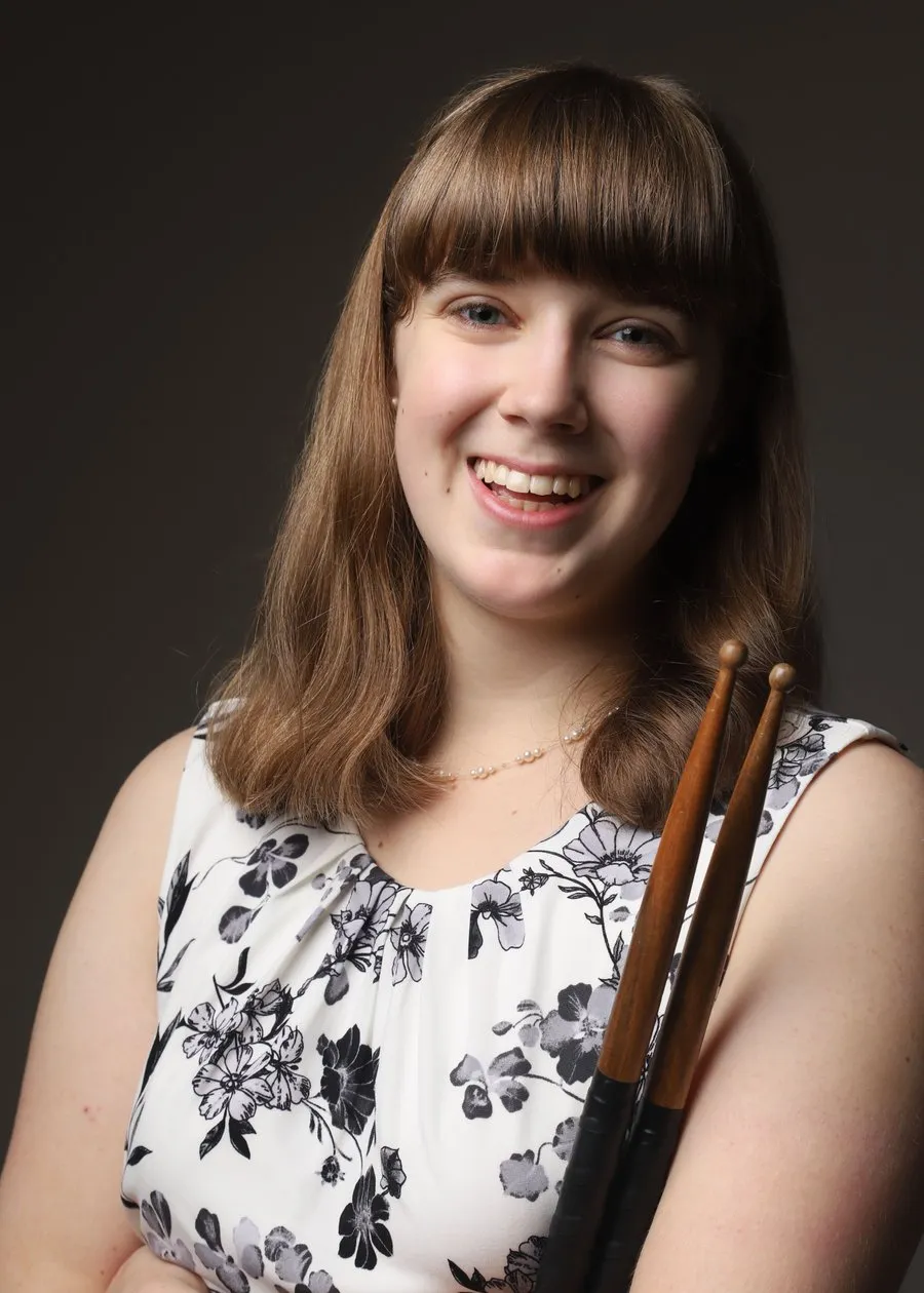 Liz Morad, percussionist, in a studio headshot portrait